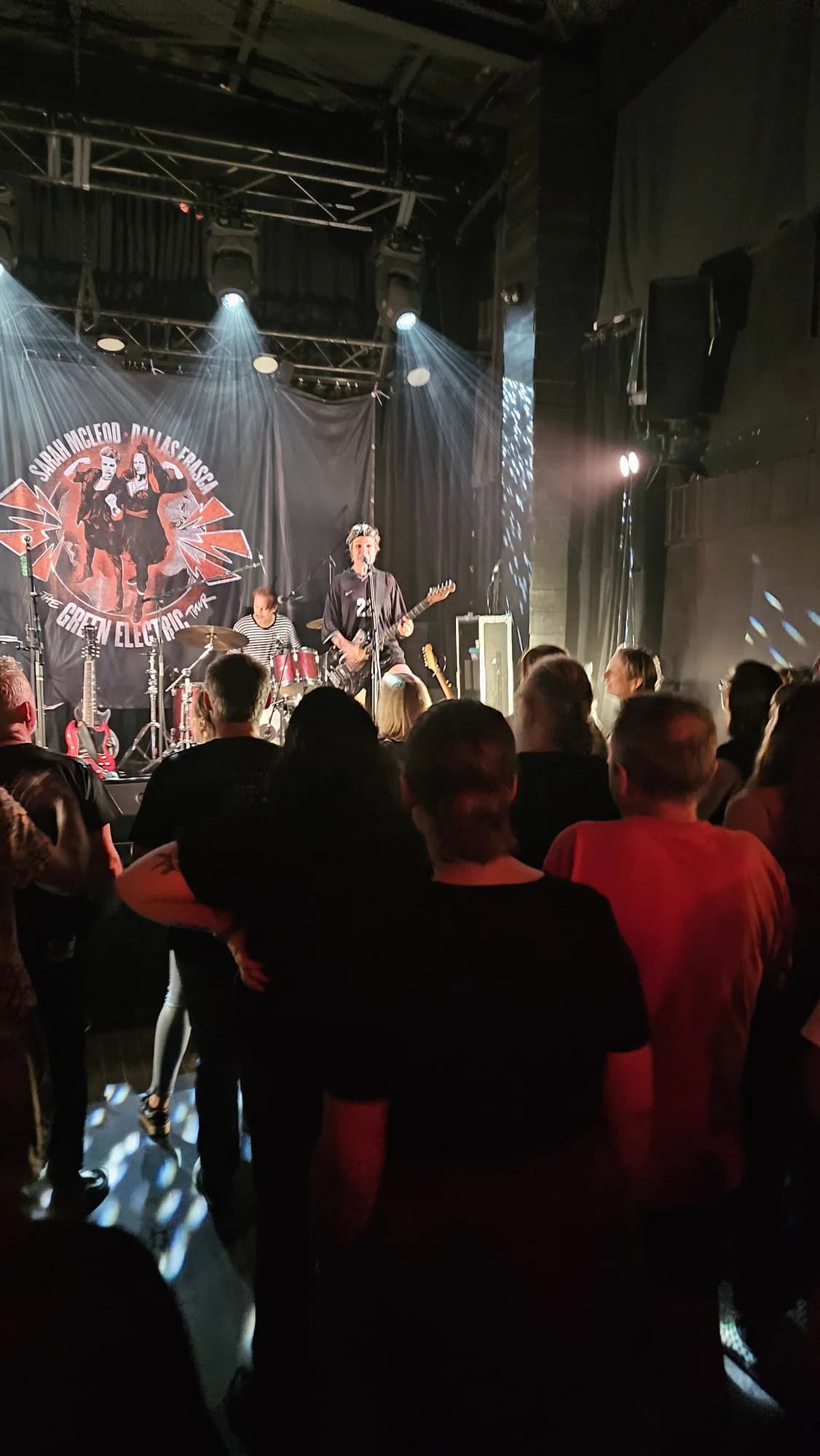 A band playing on stage to a crowd at The Prince in Wollongong